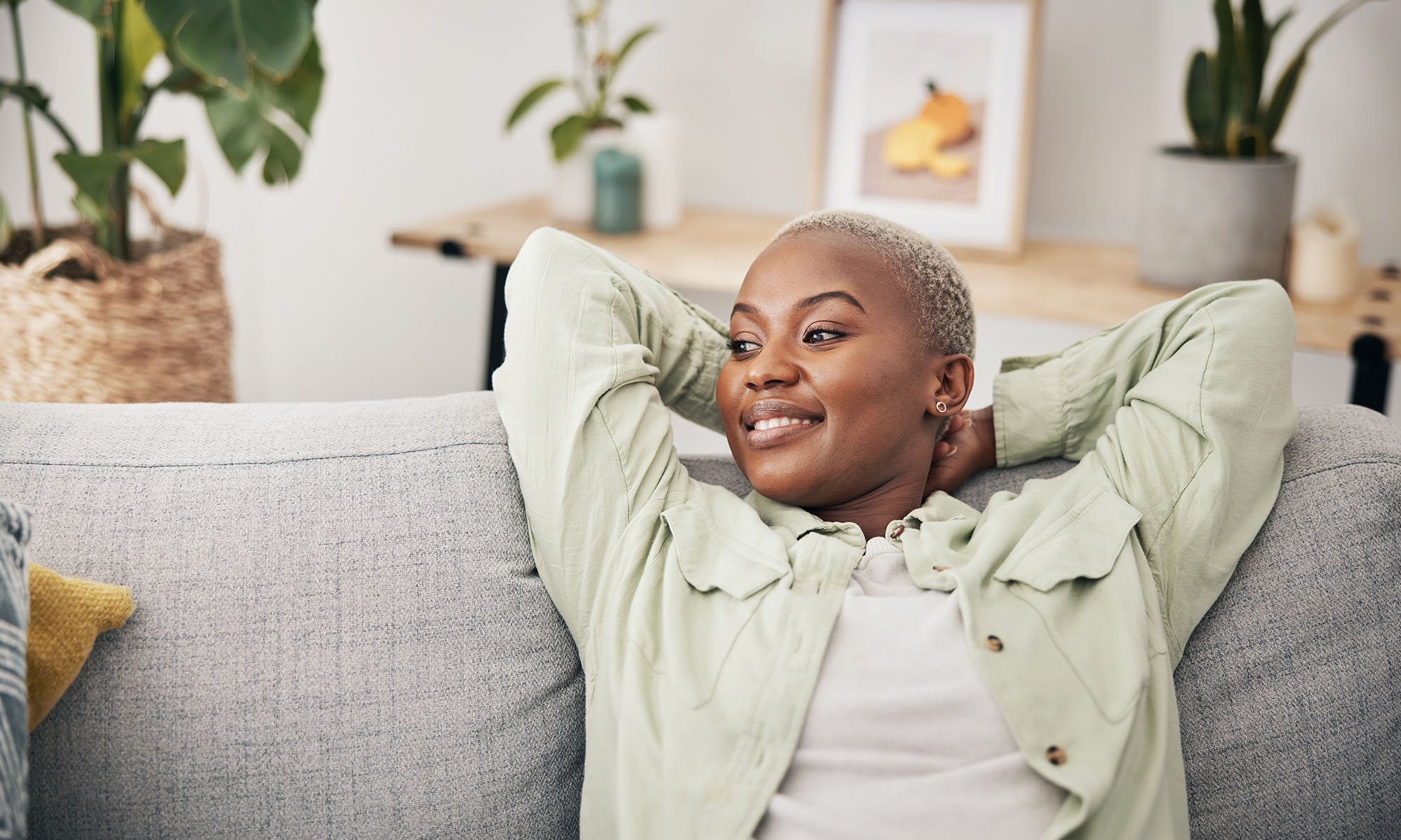 woman smiling on couch
